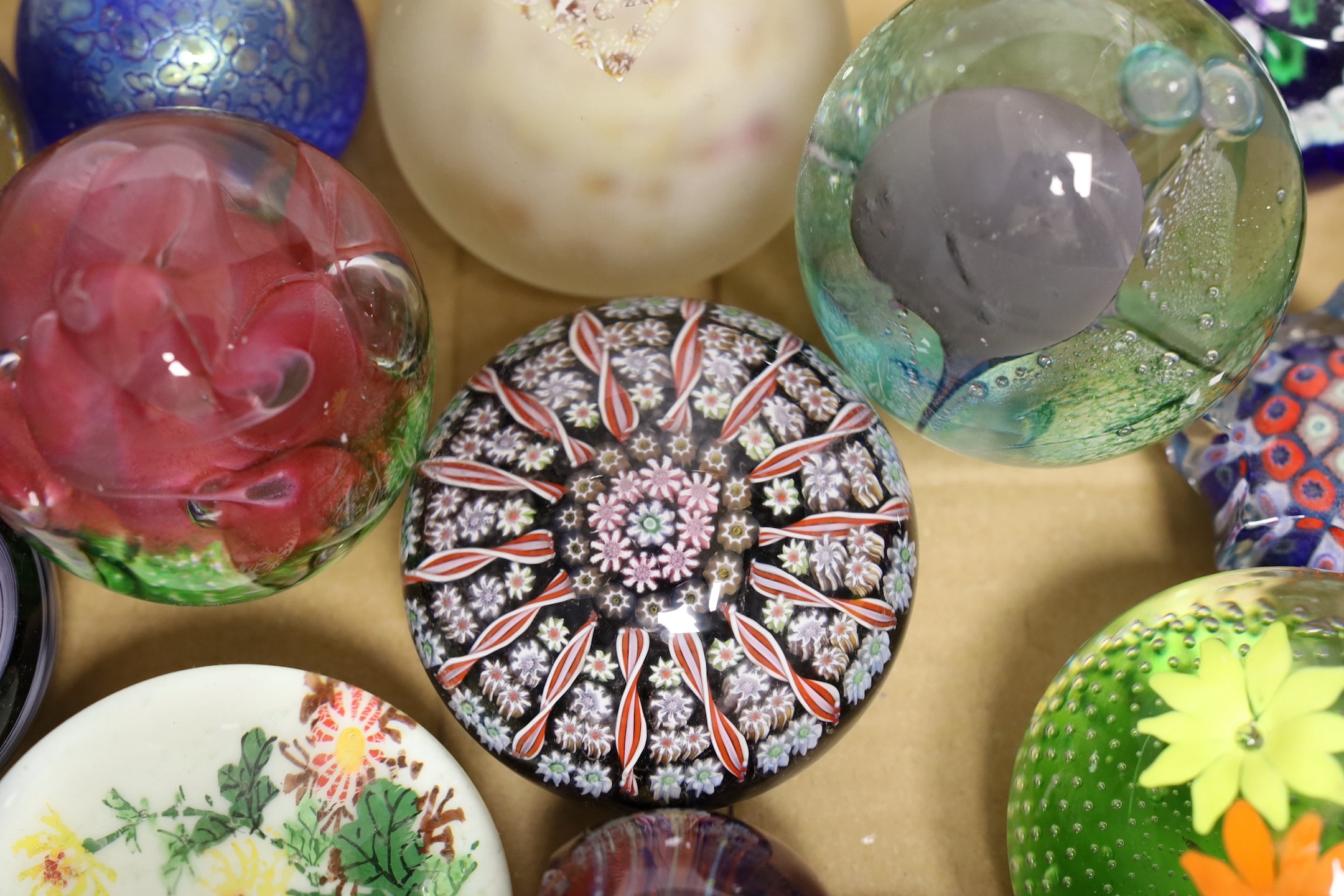 Fourteen various glass paperweights